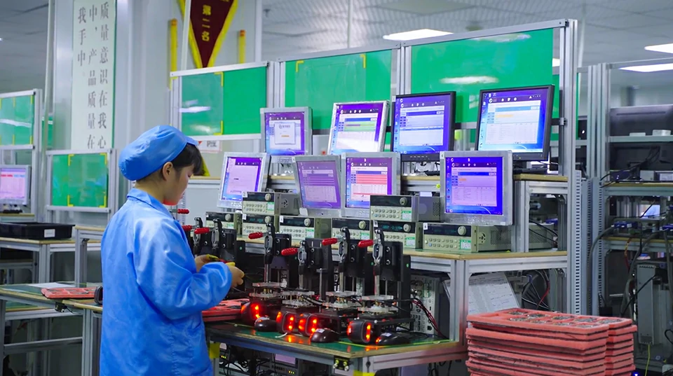 PCBA quality inspection process with testing equipment in electronics factory