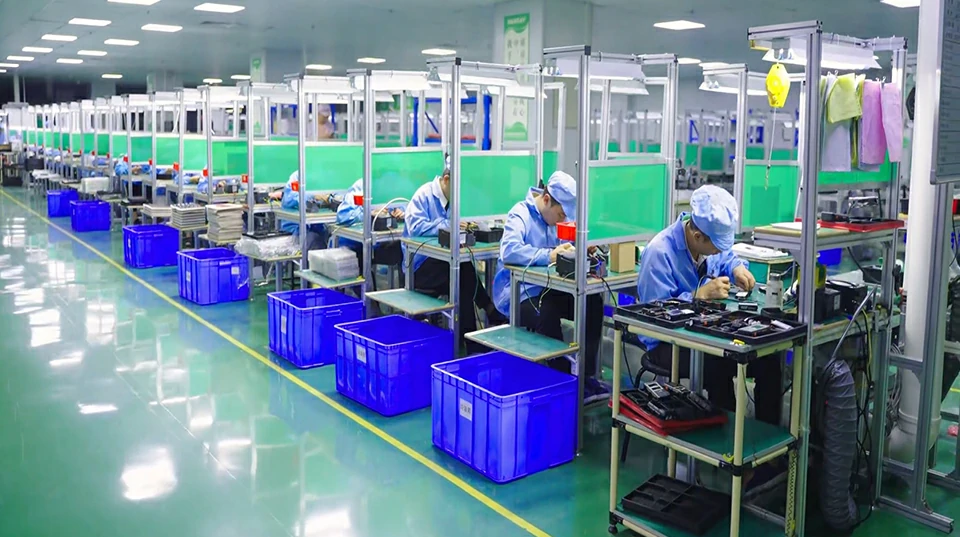 PCBA assembly line for security electronics manufacturing with skilled workers and organized workflow